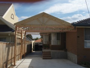Carport with eaves and trim work