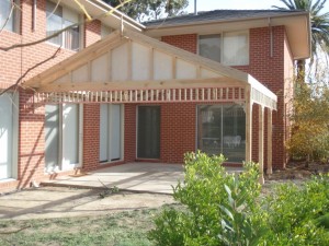 Gable veranda with eaves and trim work